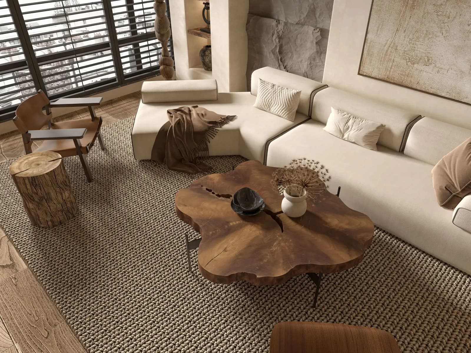 Living room with a cream sofa, a live-edge wood coffee table and a woven rug